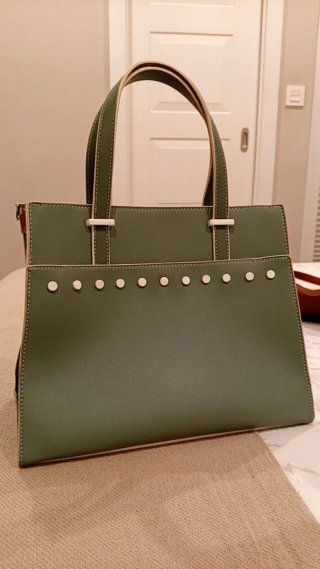 Bolso verde mar.