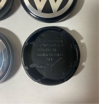 Tapabujes VW 65mm originales (4 unidades)