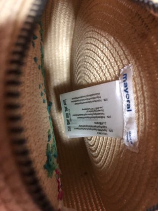 Bolso redondo de paja con palmera
