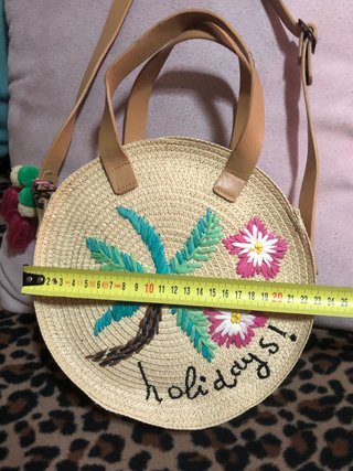 Bolso redondo de paja con palmera