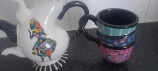 Tetera y taza Alicia en el país de las maravillas