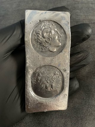 Lingote plomo sello moneda griega