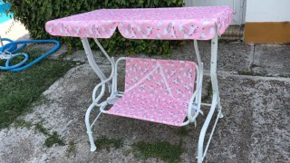 Columpio infantil con parasol
