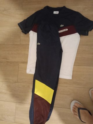 Conjunto deportivo Lacoste negro y verde