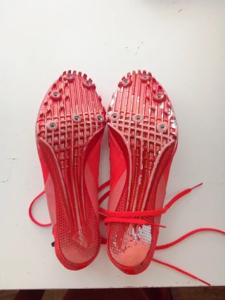 Zapatillas clavos Adidas rojas