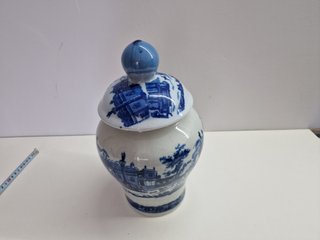 Elegante vaso in porcellana con coperchio
