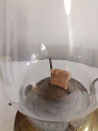 Lampada a olio antica in ottone