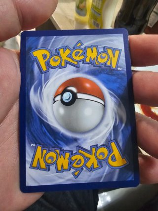 Mega Charizard X EX Carta Pokémon Dorada