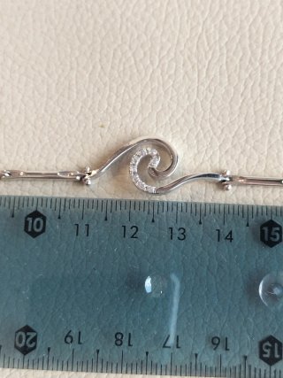 Bracciale in oro bianco da donna con zirconi, nuovo.