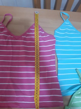 Top scollo a V € 8.50 cadauno  90%Viscosa ed elast