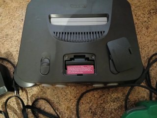Console Nintendo 64 e Controller Verde