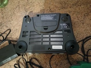 Console Nintendo 64 e Controller Verde