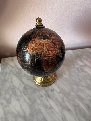 Globo terráqueo aspecto antiguo giratorio dorado