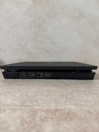 PS4 Slim Nera + 2 Controller + 4 Giochi