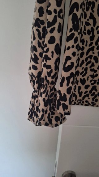 Blusa leopardo con volantes