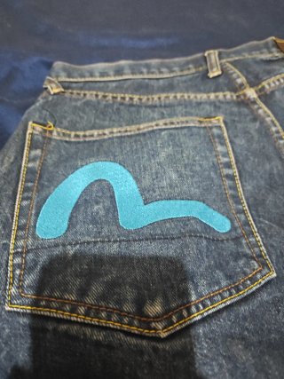 Pantalones Evisu Azules con Diseño Floral