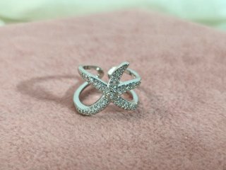 Anillo de plata diseño estrella de mar con circoni
