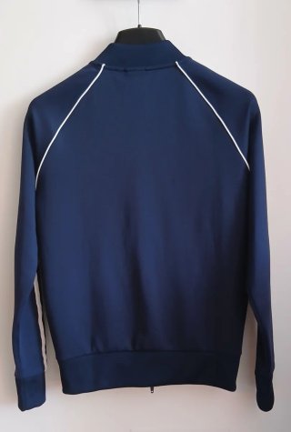 Chaqueta deportiva Adidas azul y blanca