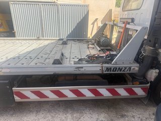 Grua porta vehículos isuzu 7.5 tn