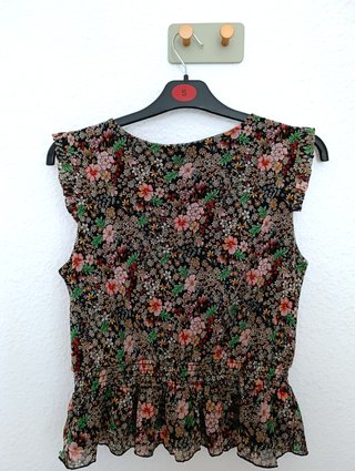 Top marca Morgan. Nuevo. Color negro con estampado