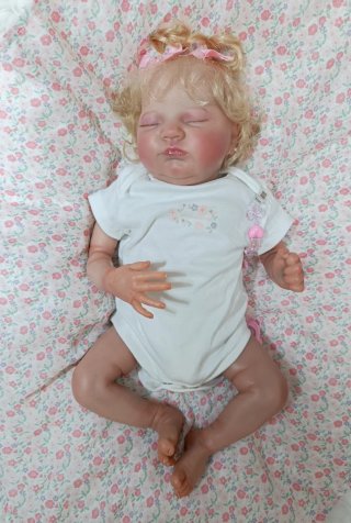 Muñeca Reborn pelo injertado