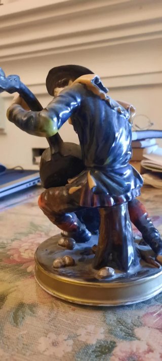Figura de porcelana músico con violín