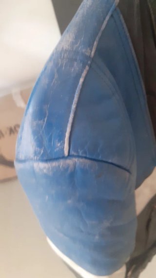 Chaqueta de moto de piel azul y negra