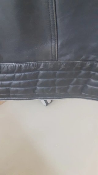 Chaqueta de moto de piel azul y negra