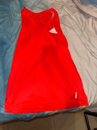Camiseta deportiva Adidas sin mangas naranja