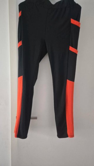 Pantalones ajustados mujer negro y naranja
