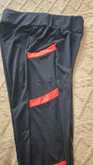 Pantalones ajustados mujer negro y naranja