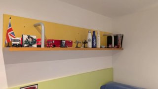Cama juvenil con cajones y estantería