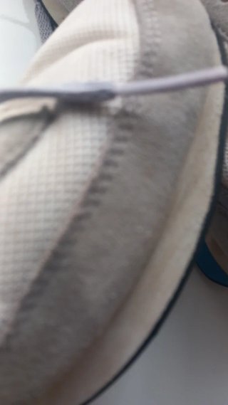 Zapatillas Nike grises y blancas