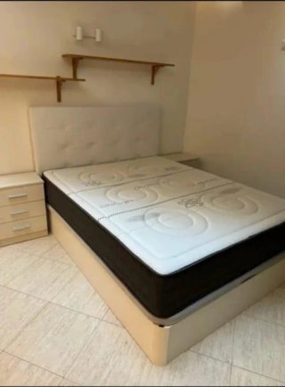 Canapé abatible de madera con colchones viscoelast