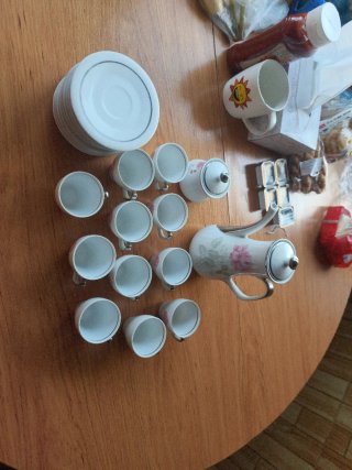 Set de tetera de porcelana y metal