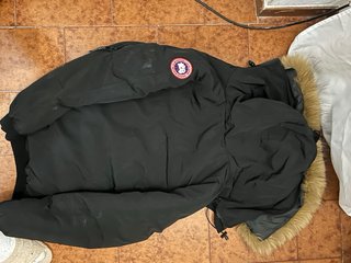 Giacca Canada nera con cappuccio