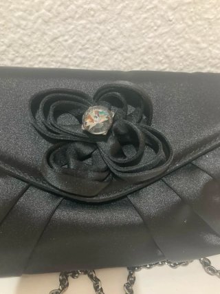 Bolso de fiesta negro Menbur con flor