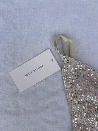 Abito lungo asimmetrico di paillettes oro