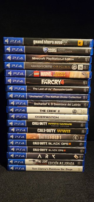 PS4 + Mando Dualshock 4 (nella sua confezione) + 19 giochi