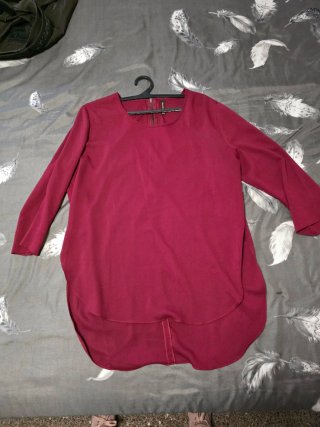 Blusa granate con cremallera