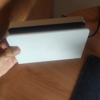 Nintendo Switch OLED + accessori e giochi