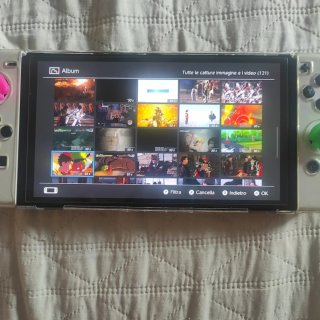 Nintendo Switch OLED + accessori e giochi