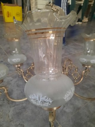 Lámpara de araña de cristal y metal