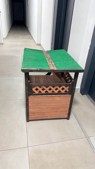 Casa de madera para gatos
