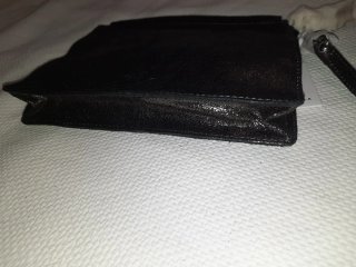 Bolso de mano negro y plateado