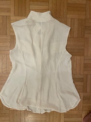 Camicetta smanicata bianco panna con pieghe