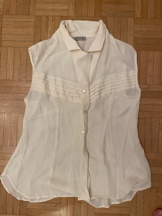 Camicetta smanicata bianco panna con pieghe