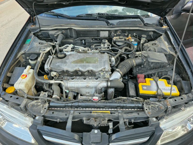 Nissan Almera 2000 - foto 1