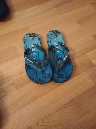 Chanclas Rip Curl palmeras azules