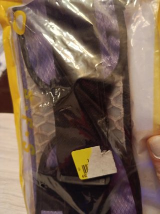 Riñonera nueva negra y morada